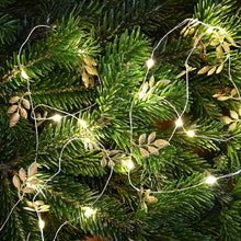 Lade das Bild in den Galerie-Viewer, Exquisite Lichterkette mit gefiederten, goldenen Blättern Weihnachtsdekoration Kunsthandel Rueckeshaeuser
