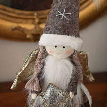 Lade das Bild in den Galerie-Viewer, Stehendes Weihnachtsengelchen im braun kariertem Röckchen und mit braunem Hut Weihnachtsdekoration Kunsthandel Rueckeshaeuser
